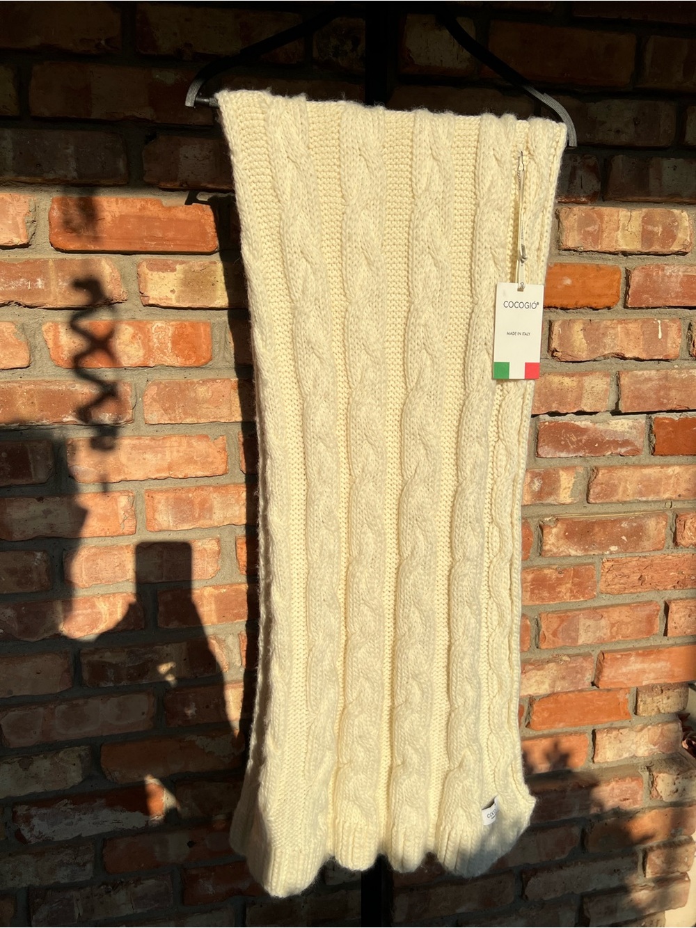 Cocogio Cream Cable Knit throw. New with tags. Acrylic, Wool, and Viscose blend.